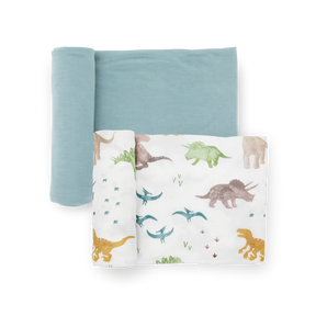 Little Unicorn Stretch Knit Swaddle Blanket 2 Pack - Dino Pals: blue swaddle and white with dino prints.