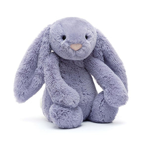 Jellycat Bashful Bunny Viola Medium: a plush bunny with long floppy ears and pink nose, sitting upright—cute & cuddly!.