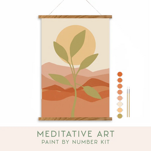 Paint By Number Kit, Desert Sunset: canvas with desert, plant, & sun, 2 brushes, & 8 acrylic paints. Text "Meditative Art Paint By Number Kit."