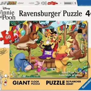 60 Piece Floor Puzzle, Pooh Magic Show: yellow & white box with cartoon illustrations; text "Disney Winnie the Pooh Ravensburger Puzzle 4+.”