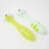 Two Sunnylife inflatable toys: Monty the Monster (lime green with spots) and a striped light green one, both on white.