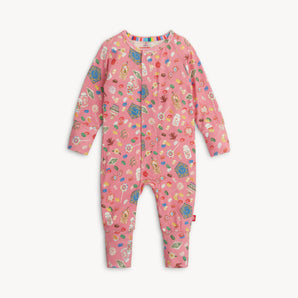 Magnetic Me, Coverall HP Honeydukes: pink long sleeve coverall pajamas with magnetic closure and candy print, made of TENCEL modal.