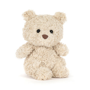 Jellycat Bartholomew Bear Junior, a beige plush teddy with black eyes and a brown nose, sits upright on a white background.