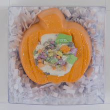Load image into Gallery viewer, Hopscotchs Sidewalk Chalk, Pumpkin-shaped with bright hues and sprinkles, in a clear box with shredded white paper.
