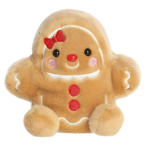 Aurora Palm Pals- Gia Gingerbread: soft, fuzzy plush doll with red bow, red buttons, pink cheeks, and a sweet smile.