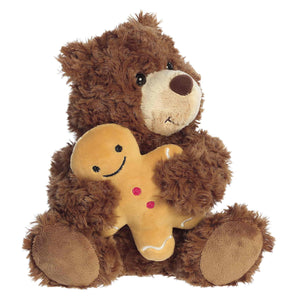 Aurora’s Bear w/ Gingerbread sits upright, exuding cozy holiday charm on a white background.