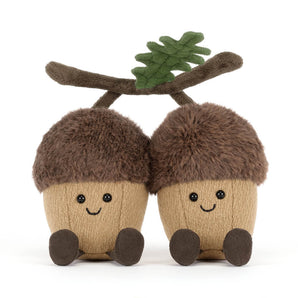 Jellycat Amuseables Ort & Tum Acorns—two cute acorns with smiling faces and green felt leaves—sit side by side on white.
