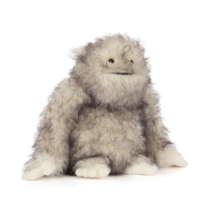 Jellycat Bretti Yeti: a limited-edition plush with shaggy gray fur, black eyes, stitched smile, and big white hands and feet.