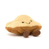 Jellycat’s Amuseables Margaux Madeleine is a dumpling-shaped plush with a smile and brown feet, perfect for any collection.