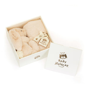 A soft Jellycat, Soother Luxe Bunny Willow inside an open gift box with the lid resting beside it.