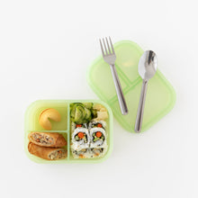 Load image into Gallery viewer, Bumkins Silicone Bento Box 3 Section: Green Jelly with spring rolls, sushi, cucumbers, and fortune cookie next to utensils on a white background.

