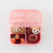 Load image into Gallery viewer, Bumkins Silicone Bento Box 3 Section: Pink Jelly holds crackers, fruit, meat, and yogurt pretzels on a white background.
