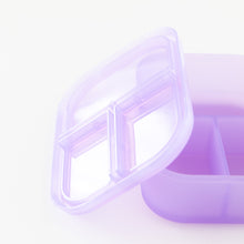 Load image into Gallery viewer, Close-up of Bumkins Silicone Bento Box 3 Section: Purple Jelly, with a leak-resistant lid and compartments, on a white background.
