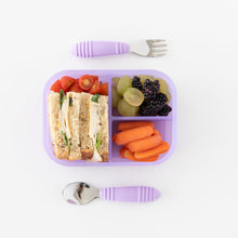 Load image into Gallery viewer, Bumkins Silicone Bento Box 3 Section: Purple Jelly holds a sandwich, fruit, and veggies on a white background with utensils on the side.
