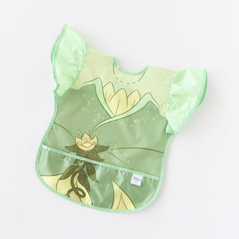 Bumkins Ruffle Apron Bib: Tiana lays flat on a white background.