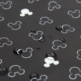 Close-up of water droplets on Bumkins Wet Bag: Mickey Mouse Icon Black + White.