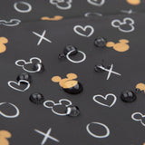 Close-up of water droplets on Bumkins Wet Bag: Minnie Mouse Icon Black + White.
