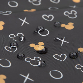 Close-up of water droplets on Bumkins Wet Bag: Minnie Mouse Icon Black + White.