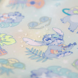 Close-up of water droplets on Bumkins Sleeved Bib: Aloha Stitch.