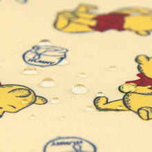 Load image into Gallery viewer, Close-up of water droplets on Bumkins Sleeved Bib: Winnie Loves Hunny.
