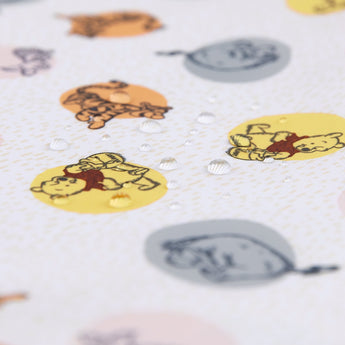 Close-up of water droplets on Bumkins Extra Large Wet Bag: Winnie + Friends.