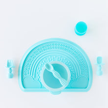Load image into Gallery viewer, Bumkins Silicone First Feeding Set: Blue sits on a blue placemat on a white background, with blue utensils and a blue cup close by.
