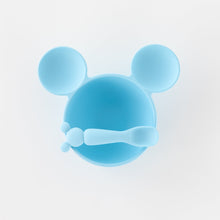 Load image into Gallery viewer, Bumkins Silicone First Feeding Set: Mickey Mouse Light Blue features a mouse-ear shaped bowl &amp; matching silicone spoon on a white background.
