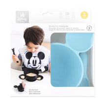Load image into Gallery viewer, Bumkins Silicone First Feeding Set: Mickey Mouse Light Blue is shown in a white packaging box, with a clear window partially showing the bowl.
