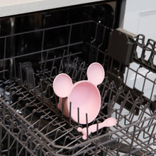 Load image into Gallery viewer, Bumkins Silicone First Feeding Set: Minnie Mouse Light Pink sits in the top rack of an open dishwasher.
