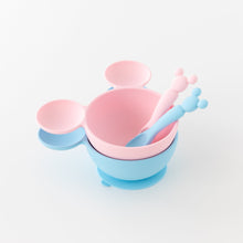 Load image into Gallery viewer, Bumkins Silicone First Feeding Set: Minnie Mouse Light Pink is stacked on top of another similar bowl on a white background.
