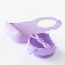 Load image into Gallery viewer, Bumkins Silicone First Feeding Set: Lavender sits on a white background with a matching silicone bib blurred behind.
