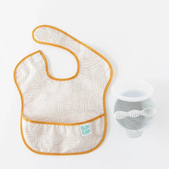 Bumkins Silicone First Feeding Set: Marble sits next to a beige patterned bib on a white background.
