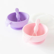 Load image into Gallery viewer, Bumkins Silicone First Feeding Set: Pink sits in front of a purple bowl and spoon set on a white background.
