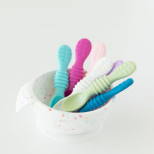 Load image into Gallery viewer, Bumkins Silicone First Feeding Set: Vanilla Sprinkle with colorful baby spoons inside on a white background.
