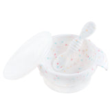 Bumkins Silicone First Feeding Set: Vanilla Sprinkle includes a white speckled bowl with secure suction base, matching spoon, and clear lid.