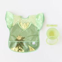 Load image into Gallery viewer, Bumkins Ruffle Apron Bib: Tiana lays next to a green bowl, spoon, &amp; lid set on a white background.
