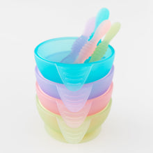 Load image into Gallery viewer, A stack of four colorful bowls with spoons, on a white background, with Bumkins Silicone First Feeding Set: Green Jelly on the bottom.
