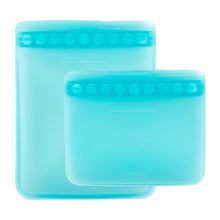 Load image into Gallery viewer, Bumkins Silicone Flat Reusable Bag 2 Pack, Blue includes two transparent bags with child-friendly closures, made from food-safe silicone.
