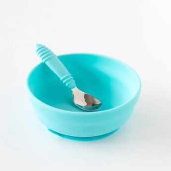 Bumkins Silicone Grip Bowl: Blue sits on a white background with a matching spoon inside.