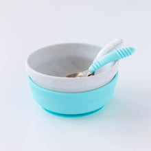 Load image into Gallery viewer, Bumkins Silicone Grip Bowl: Marble sits stacked on top of a blue bowl, with two spoons inside, on a white background.
