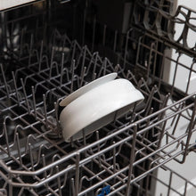 Load image into Gallery viewer, Bumkins Silicone Grip Bowl: Marble sits in the top rack of an open dishwasher.
