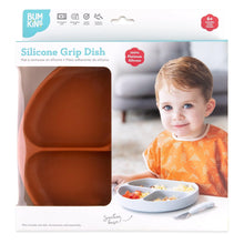 Load image into Gallery viewer, Bumkins Silicone Grip Dish: Clay in a white packaging box with a photo of a child and a clear window partially displaying the dish.
