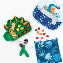 Load image into Gallery viewer, Bumkins Silicone Grip Dish, Special Edition: Dino holds a colorful toddler meal on a white background with utensils, snack bag, &amp; bib nearby.
