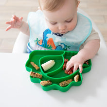 Load image into Gallery viewer, A baby in a highchair wearing a dinosaur bib explores finger food from Bumkins Silicone Grip Dish, Special Edition: Dino.
