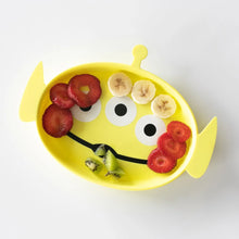 Load image into Gallery viewer, Bumkins Silicone Grip Dish: Toy Story Alien holds strawberry, banana, and kiwi slices on a white background.
