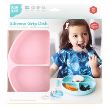 Load image into Gallery viewer, Bumkins Silicone Grip Dish: Pink in a white packaging box with a photo of a child and a clear window partially displaying the dish.
