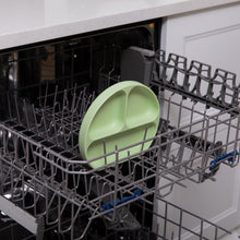 Load image into Gallery viewer, Bumkins Silicone Grip Dish: Sage sits in the top rack of an open dishwasher.
