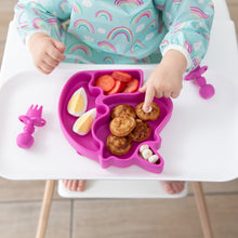 Load image into Gallery viewer, Close-up of a child reaching for breakfast food from a unicorn-shaped plate with Bumkins Silicone Chewtensils®: Fuchsia nearby.
