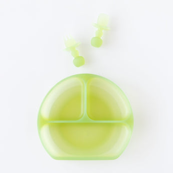Bumkins Silicone Chewtensils®: Green Jelly rest above a matching divided plate on a white background.