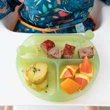 Load image into Gallery viewer, Bumkins Silicone Grip Dish: Green Jelly holds meatloaf, potatoes, and orange wedges with green toddler utensils on a high chair tray.
